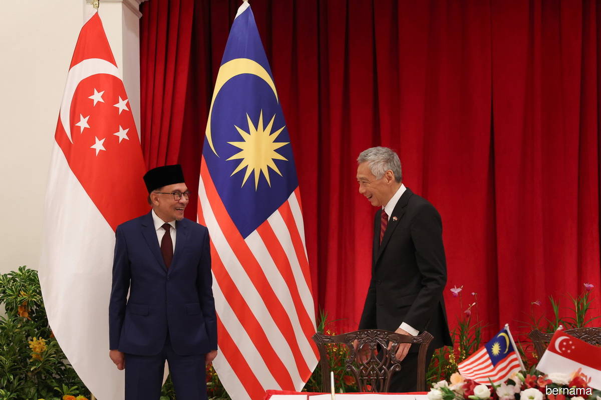 Prime Minister Datuk Seri Anwar Ibrahim (left) and his Singapore counterpart Lee Hsien Loong 'had a fruitful discussion', according to Lee in a speech.
